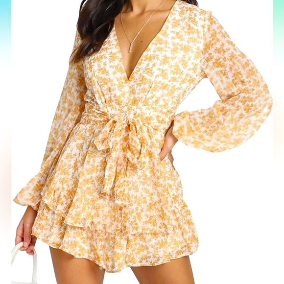 Pants - Like New Floral Romper. Size large. Worn once